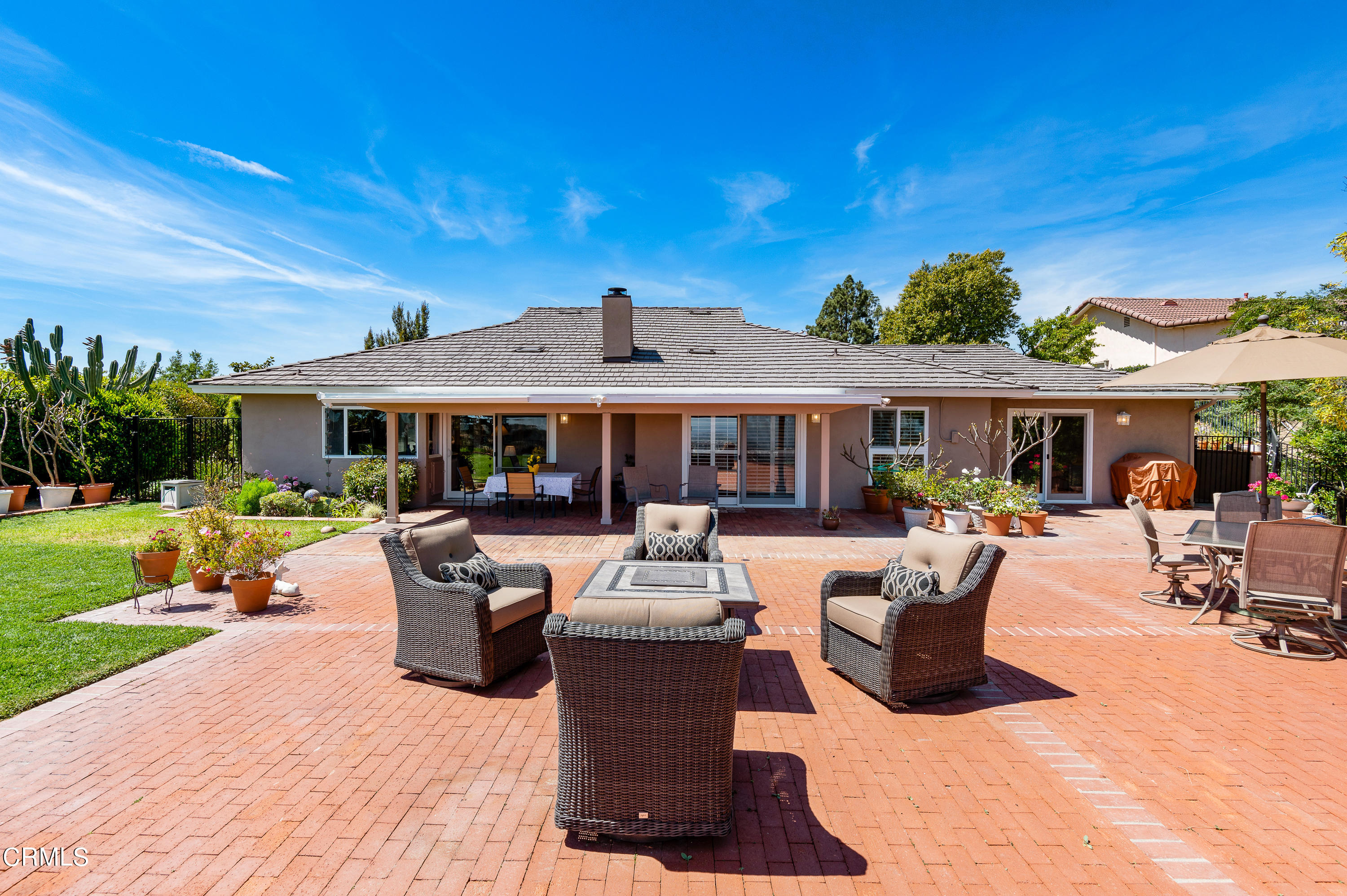 3894 San Augustine Drive Glendale, CA 91206 - Photo 28 of 51 a view of a house with swimming pool and chairs