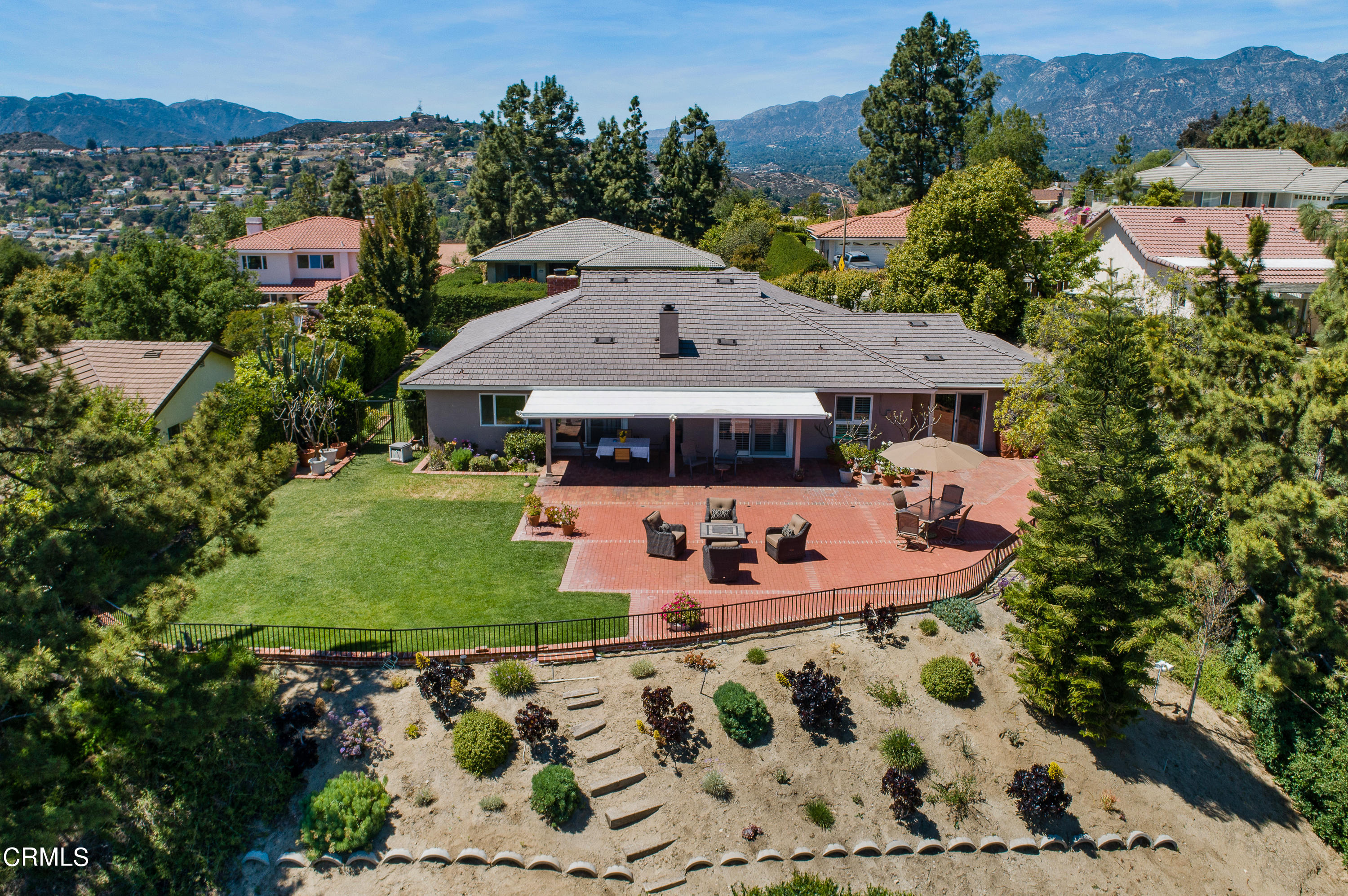 3894 San Augustine Drive Glendale, CA 91206 - Photo 39 of 51 an aerial view of a house with garden space seating and mountain view