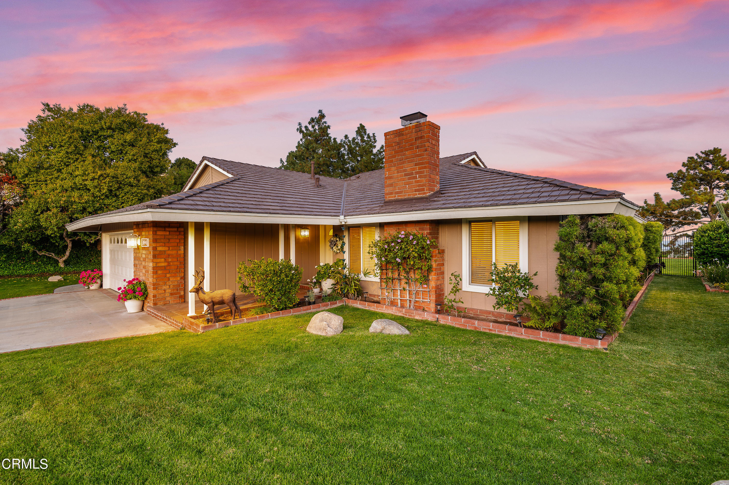 3894 San Augustine Drive Glendale, CA 91206 - Photo 41 of 51 a front view of a house with patio and garden
