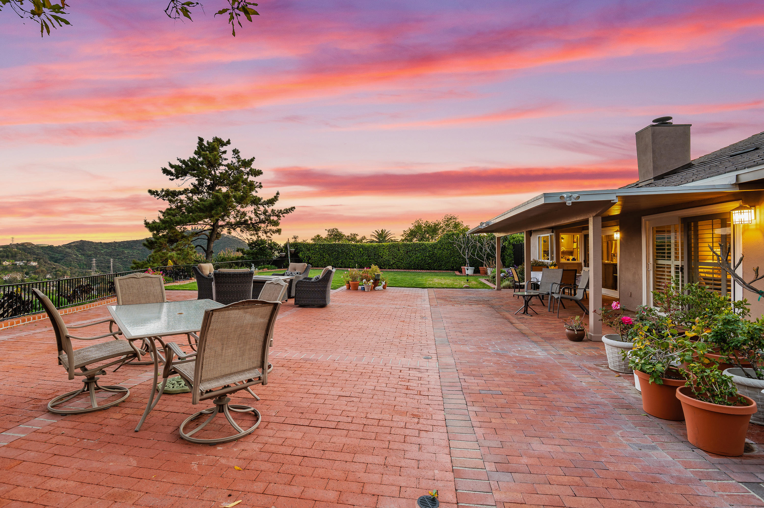 3894 San Augustine Drive Glendale, CA 91206 - Photo 45 of 51 a view of a patio with a table and chairs