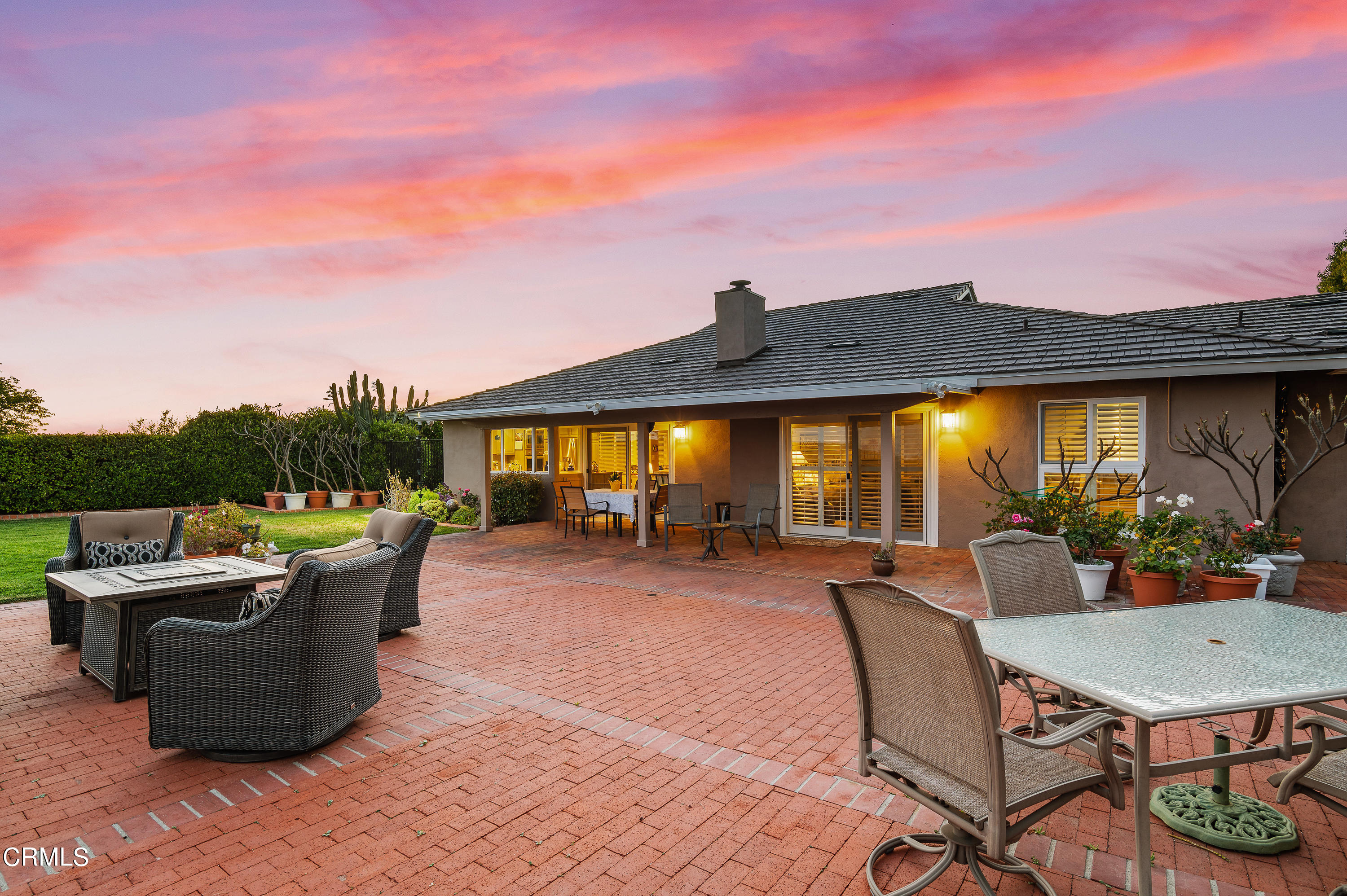 3894 San Augustine Drive Glendale, CA 91206 - Photo 50 of 51 a view of a patio with couches table and chairs under an umbrella