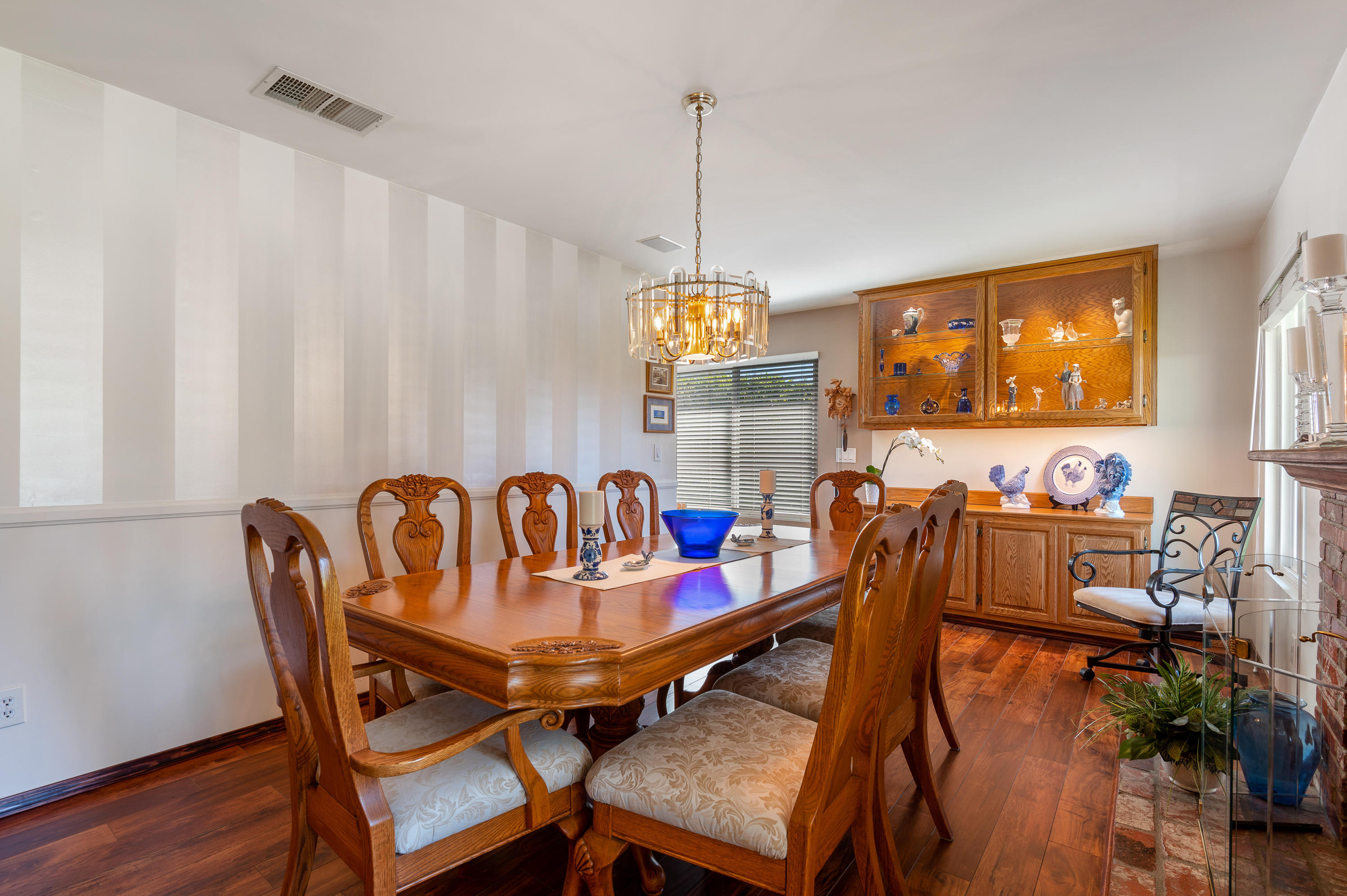 3894 San Augustine Drive Glendale, CA 91206 - Photo 7 of 51 a view of a dining room with furniture window and wooden floor
