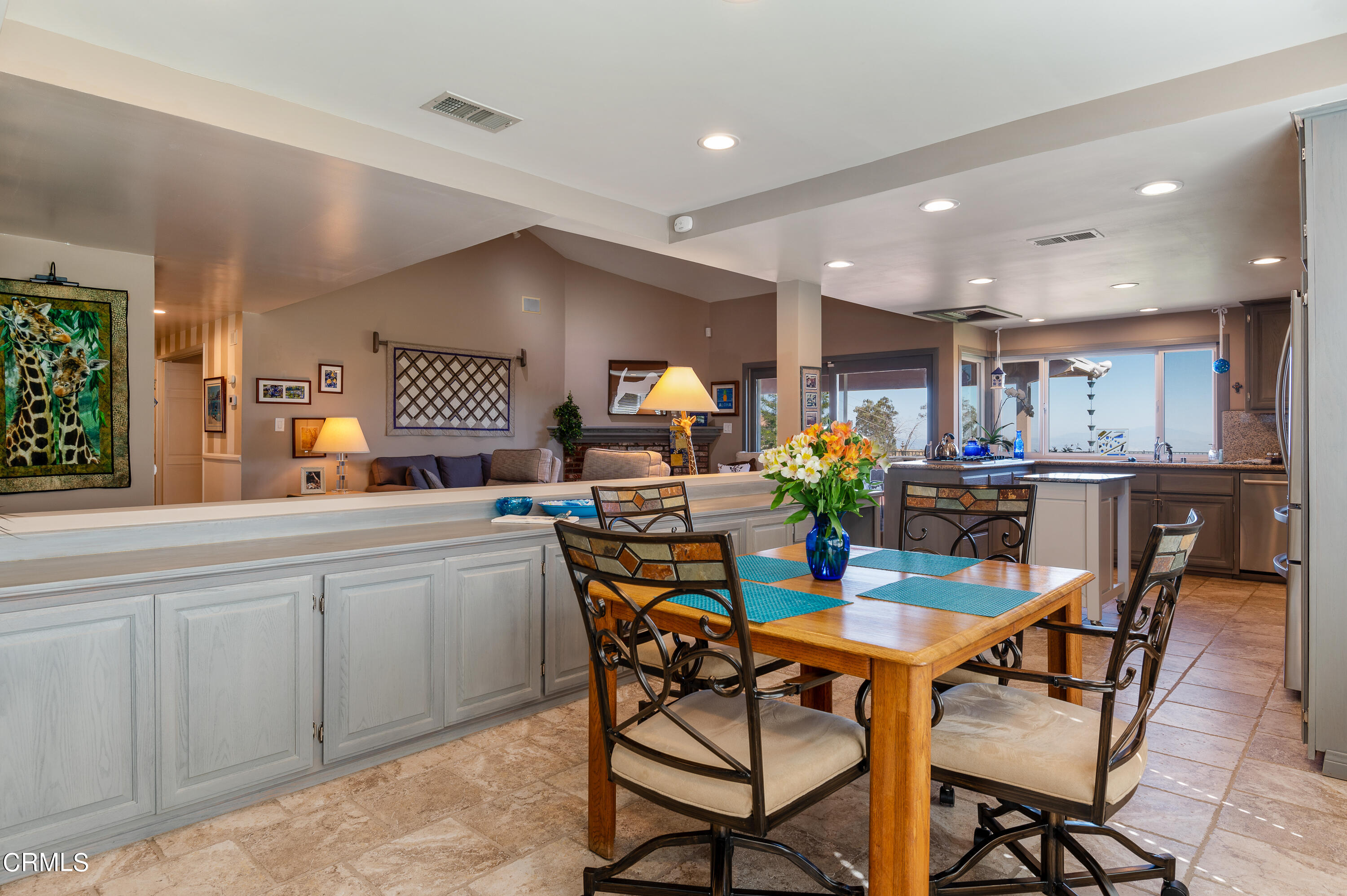 3894 San Augustine Drive Glendale, CA 91206 - Photo 8 of 51 a kitchen with a dining table chairs and view kitchen