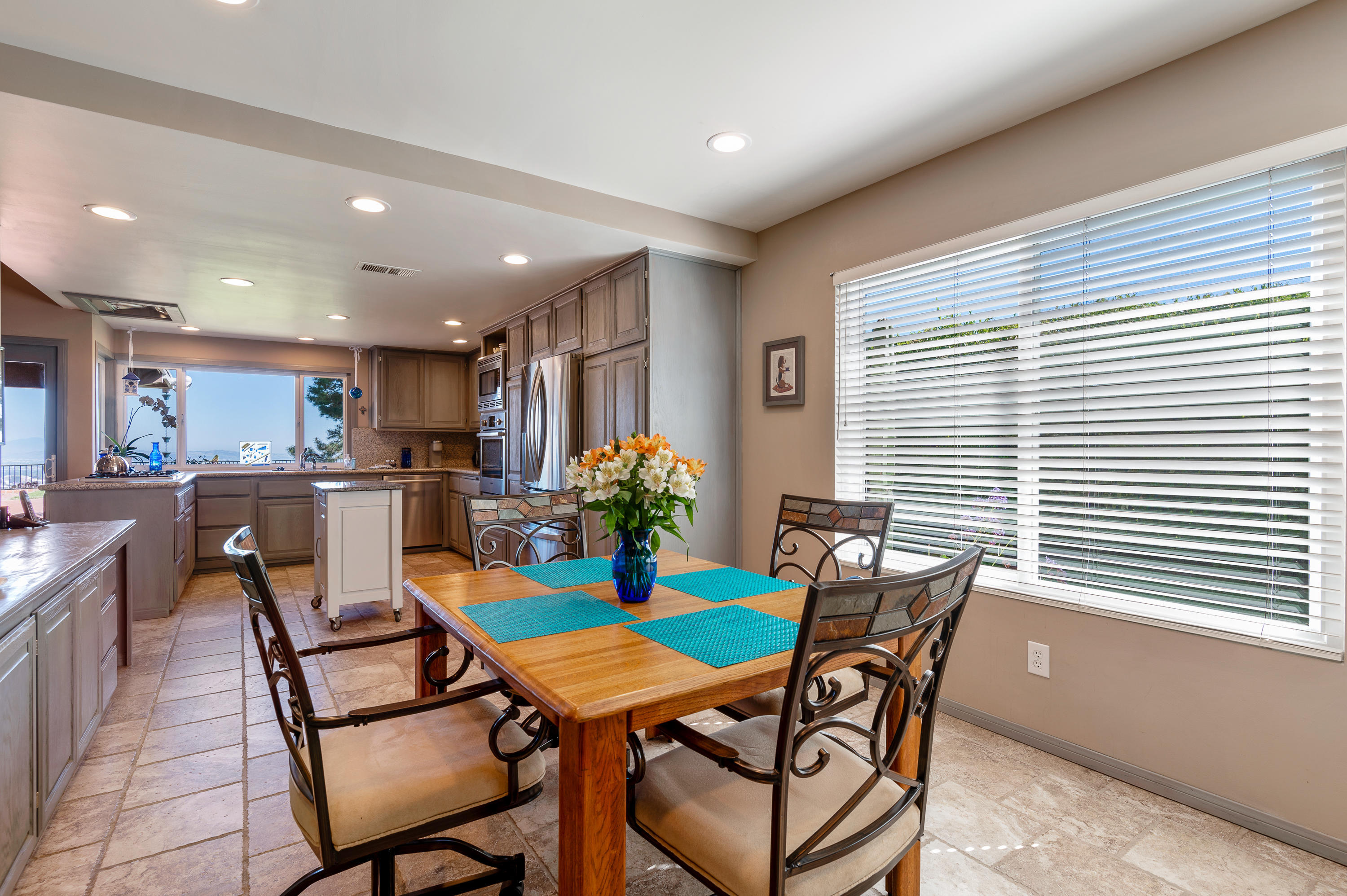 3894 San Augustine Drive Glendale, CA 91206 - Photo 9 of 51 a view of a dining room with furniture and a potted plant