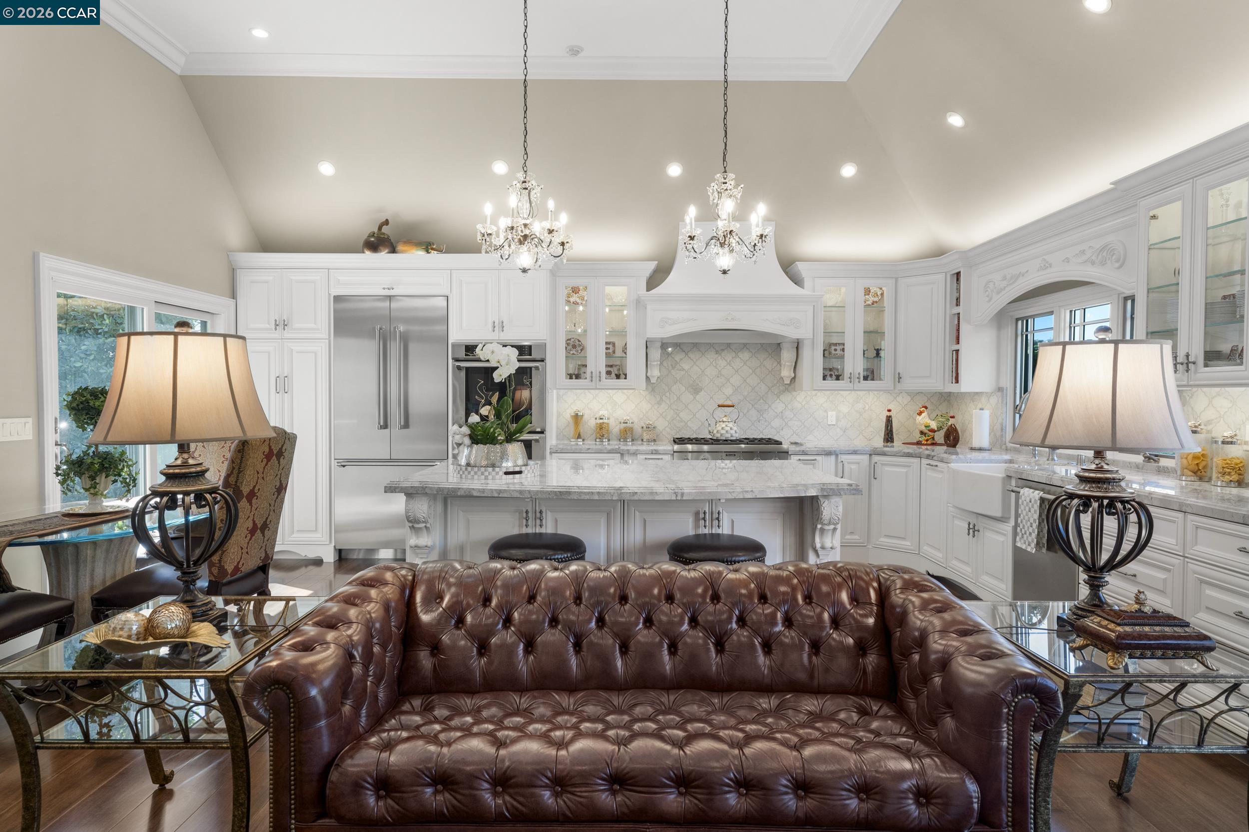 114 Golden Ridge Road Alamo, CA 94507 - Photo 11 of 60 a living room with furniture kitchen view and a chandelier