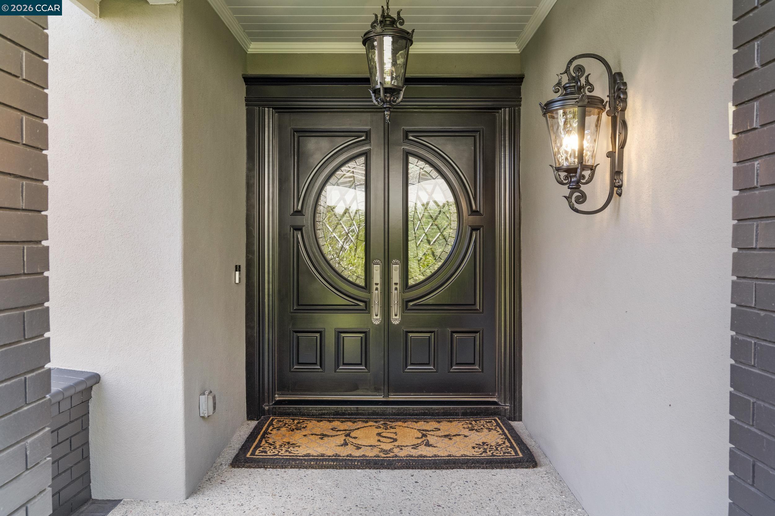 114 Golden Ridge Road Alamo, CA 94507 - Photo 2 of 60 a view of a entryway door with wooden door