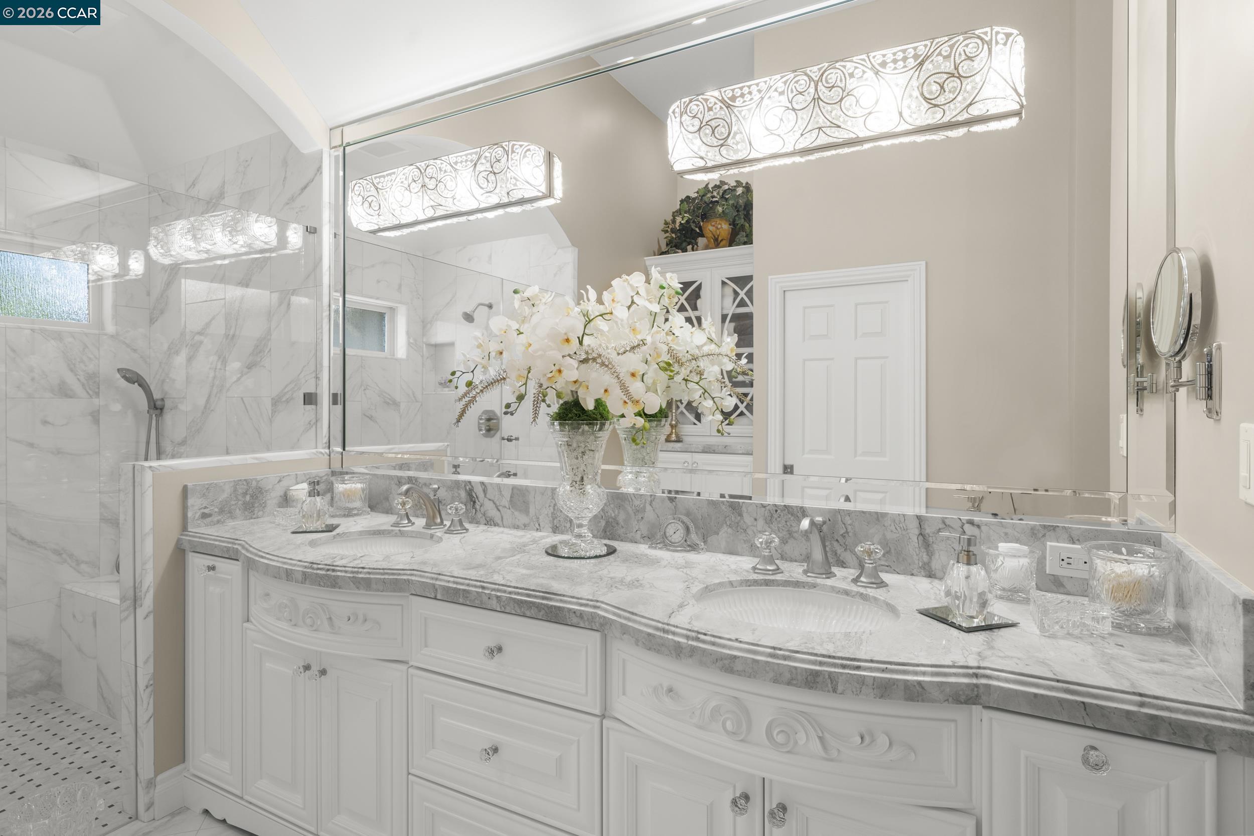 114 Golden Ridge Road Alamo, CA 94507 - Photo 22 of 60 a bathroom with double sink and a mirror