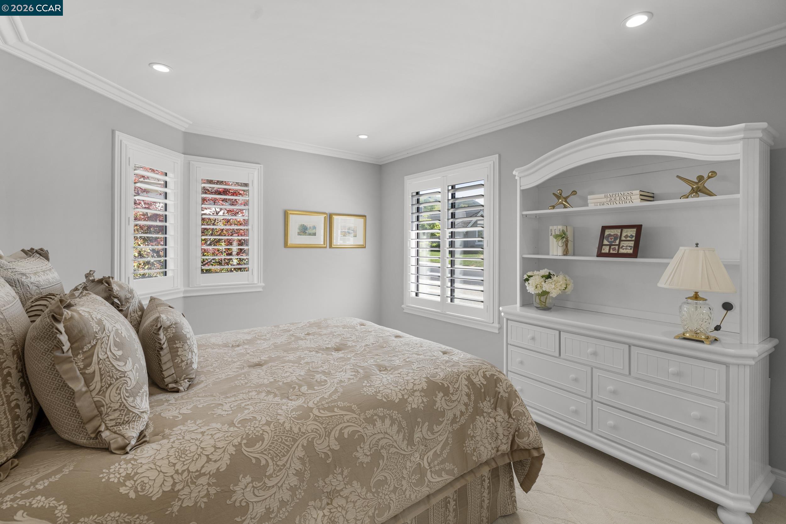 114 Golden Ridge Road Alamo, CA 94507 - Photo 25 of 60 a bedroom with a bed a dresser and next to a window