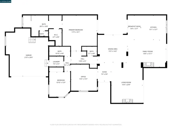 an aerial view of a house with a yard and potted plants