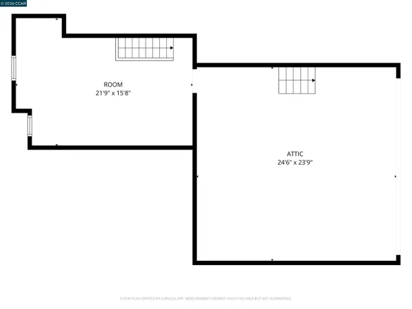an aerial view of a house with a garden and swimming pool