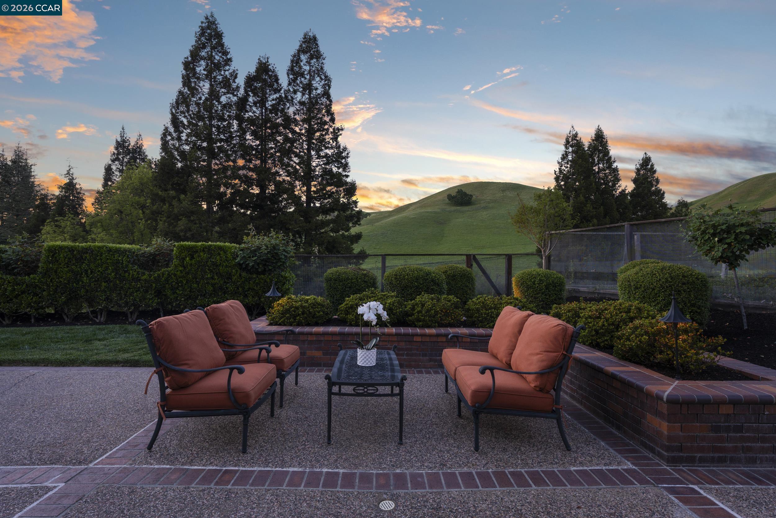 114 Golden Ridge Road Alamo, CA 94507 - Photo 56 of 60 a view of a chairs and table in the back yard