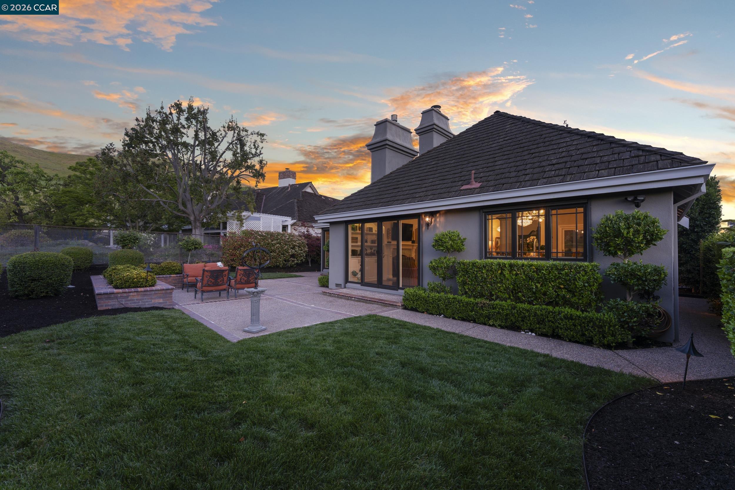 114 Golden Ridge Road Alamo, CA 94507 - Photo 58 of 60 a front view of a house with a garden and patio