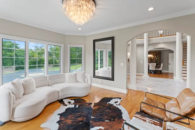 a kitchen with stainless steel appliances kitchen island granite countertop a stove and a sink
