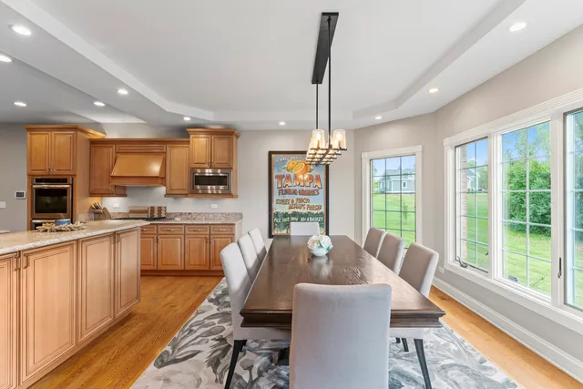 a kitchen that has a sink and a stove in it