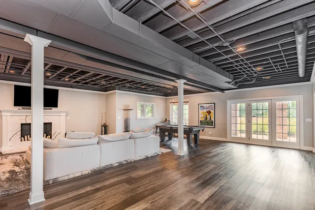 a view of walk in closet with clothes