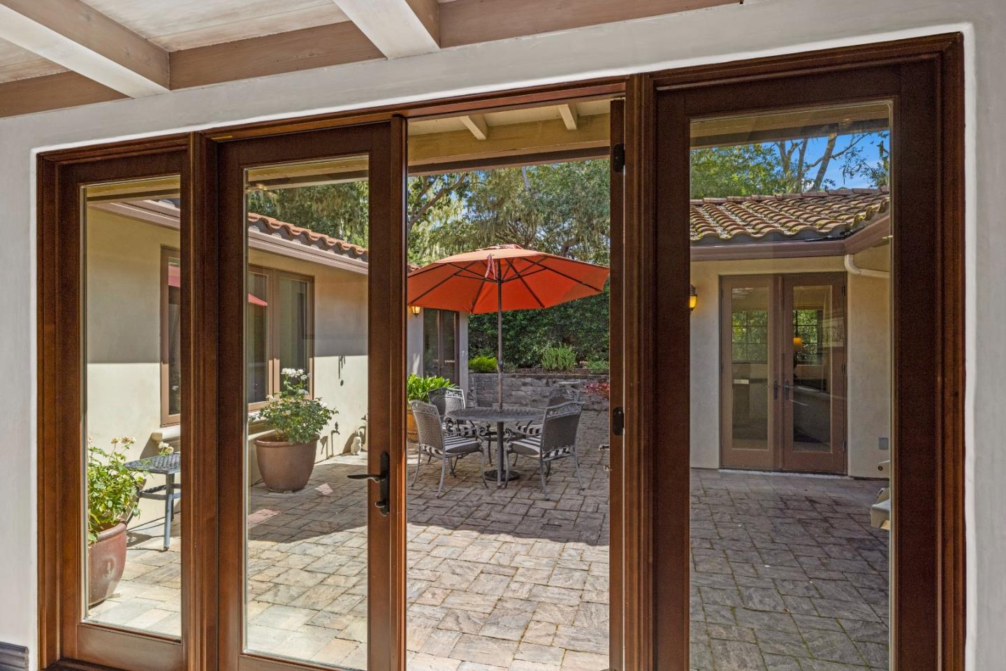 1156 Arroyo Drive Pebble Beach, CA 93953 - Photo 3 of 42 a view of a porch with furniture and garden