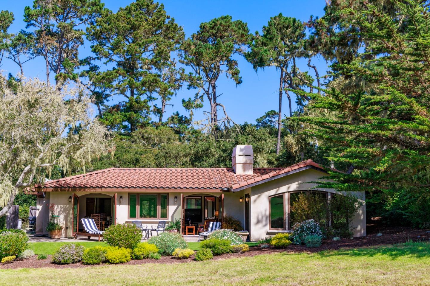 1156 Arroyo Drive Pebble Beach, CA 93953 - Photo 40 of 42 a front view of a house with garden