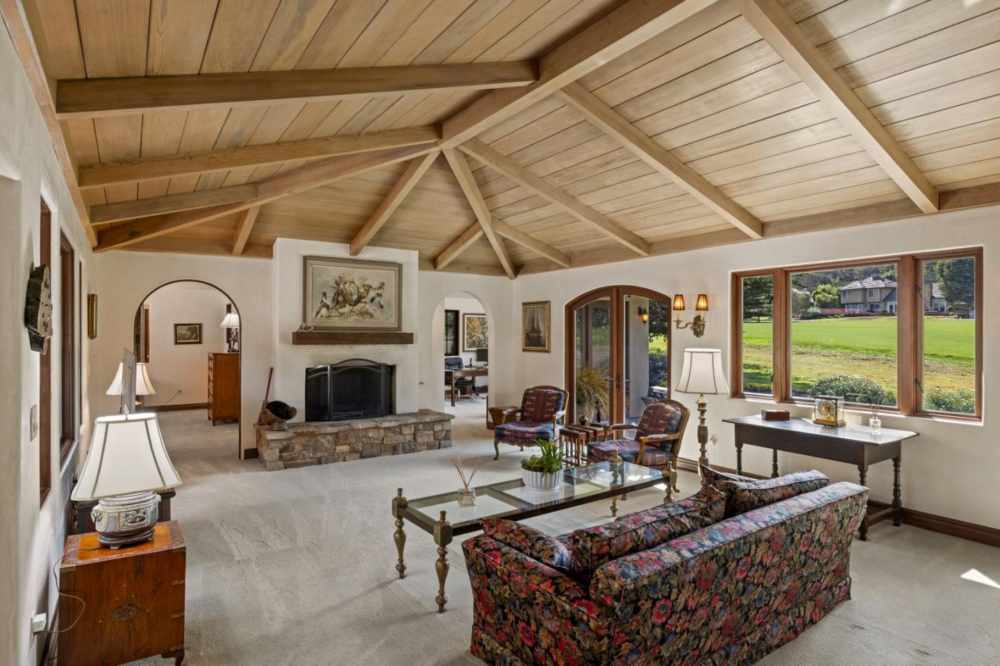 1156 Arroyo Drive Pebble Beach, CA 93953 - Photo 5 of 42 a living room with fireplace furniture and a large window
