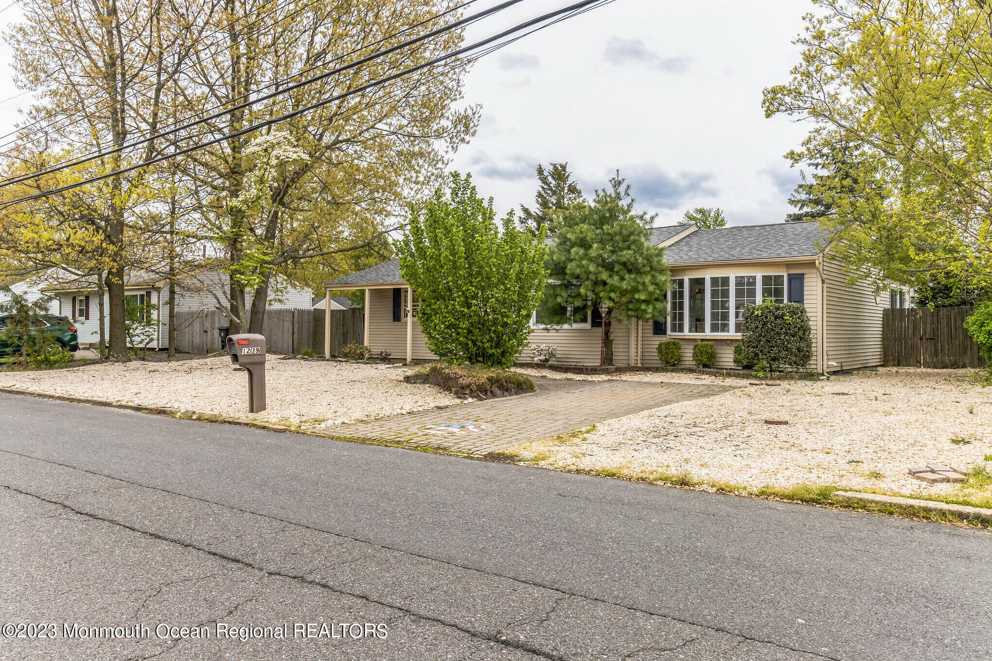 1239 Hancock Road Toms River, NJ 08753 - Photo 3 of 25 a front view of a house with a yard