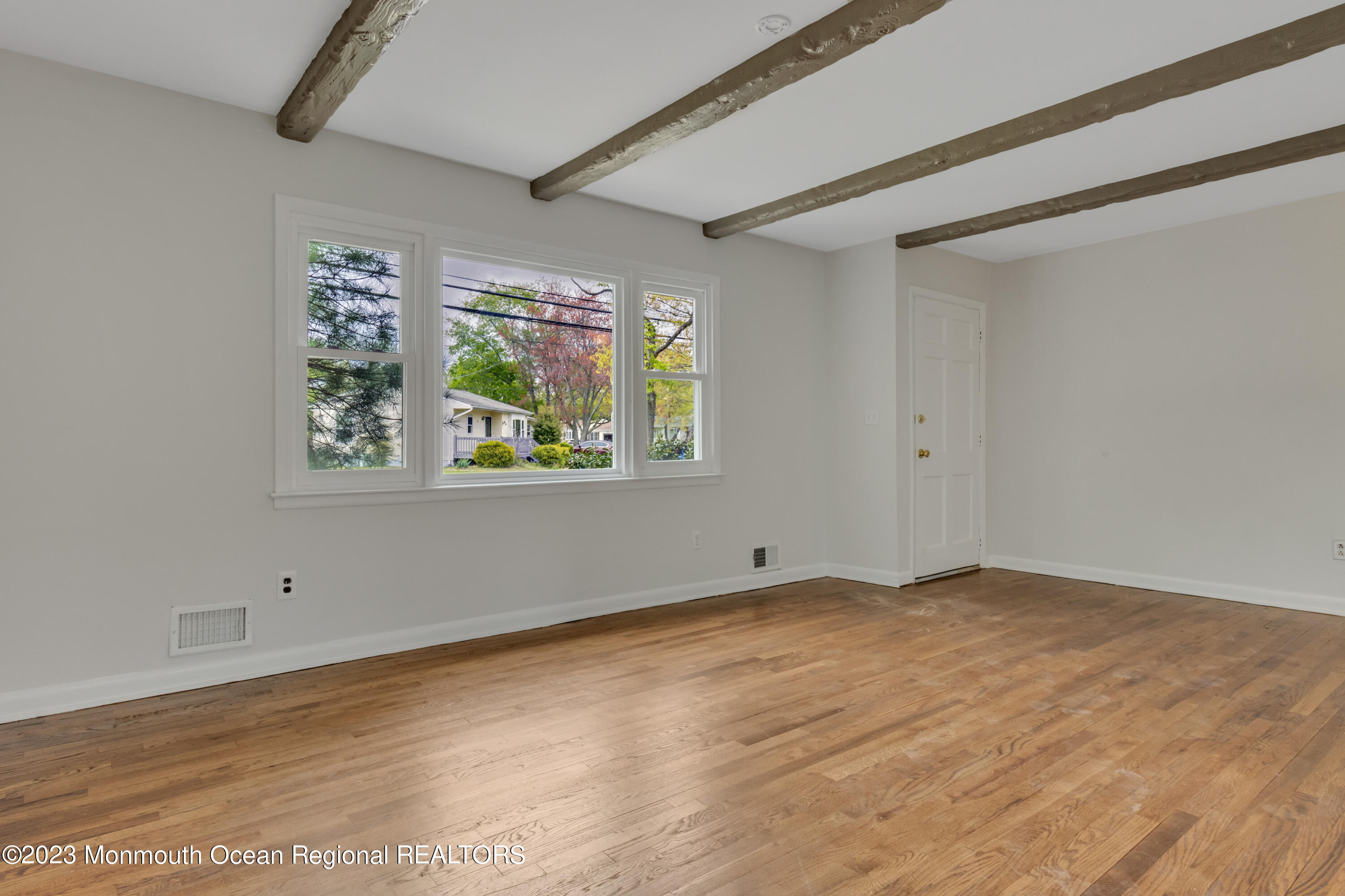 1239 Hancock Road Toms River, NJ 08753 - Photo 8 of 25 a view of an empty room with window