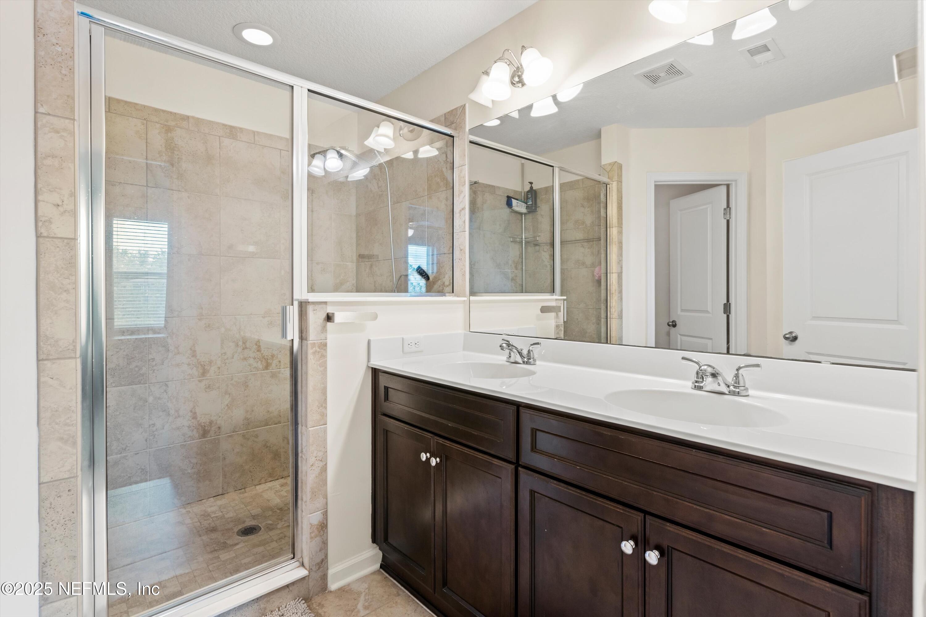 3267 Chestnut Ridge Way Orange Park, FL 32065 - Photo 17 of 43 Primary Bathroom