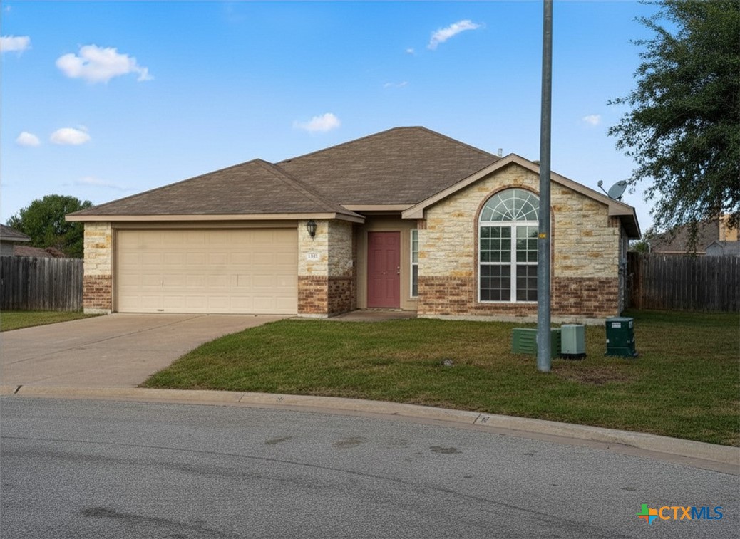 1222 Abbey Ridge Temple, TX 76504 - Photo 1 of 1 a front view of a house with a garden
