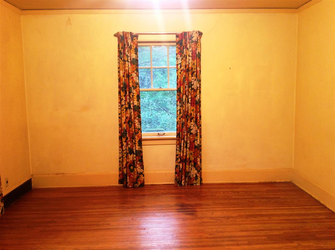 4627 Spring Brook Road Rockford, IL 61114 - Photo 19 of 19 a view of a room with wooden floor and a window