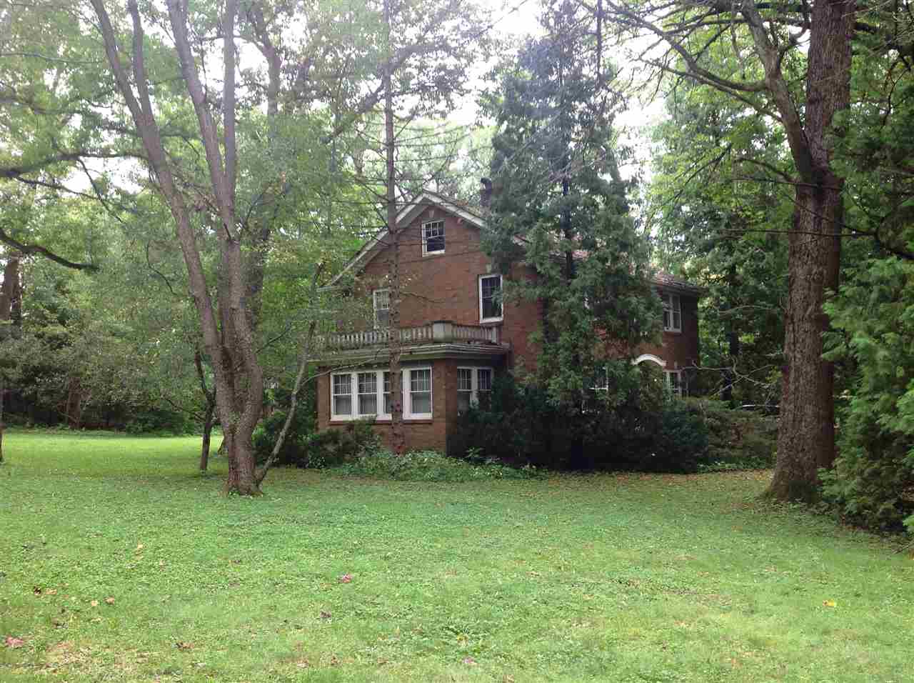 4627 Spring Brook Road Rockford, IL 61114 - Photo 2 of 19 front view of a house with a yard