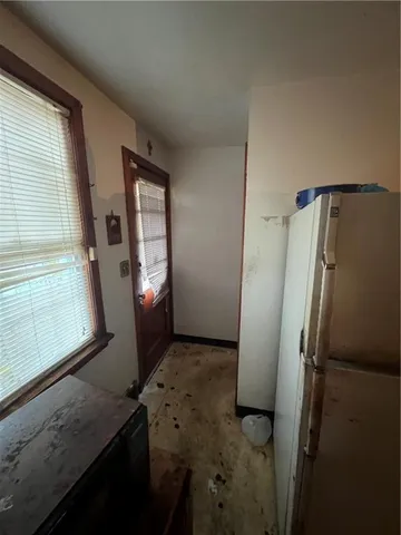 a view of a storage & utility room in a kitchen