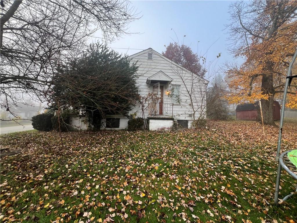 503 Main Street Leechburg, PA 15656 - Photo 7 of 20 a front view of a house with a yard
