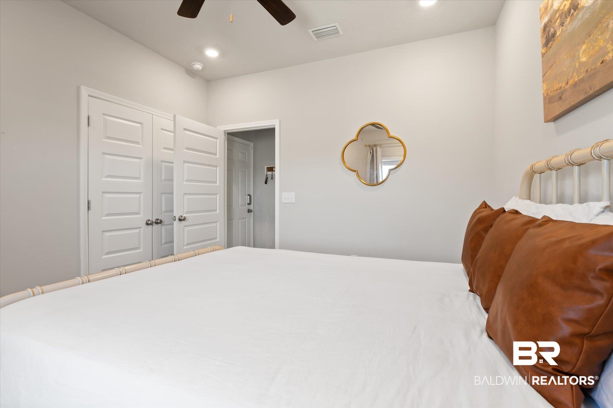 12899 Sanderling Loop Daphne, AL 36527 - Photo 25 of 28 Bedroom with a closet and ceiling fan