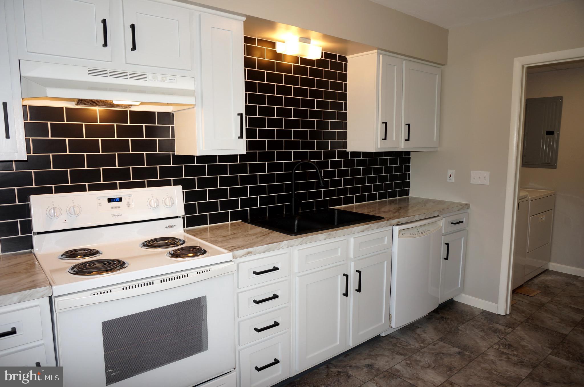 621 Range End Road, Unit 3 Dillsburg, PA 17019 - Photo 13 of 39 Electric Range & New Comfort Vinyl Flooring