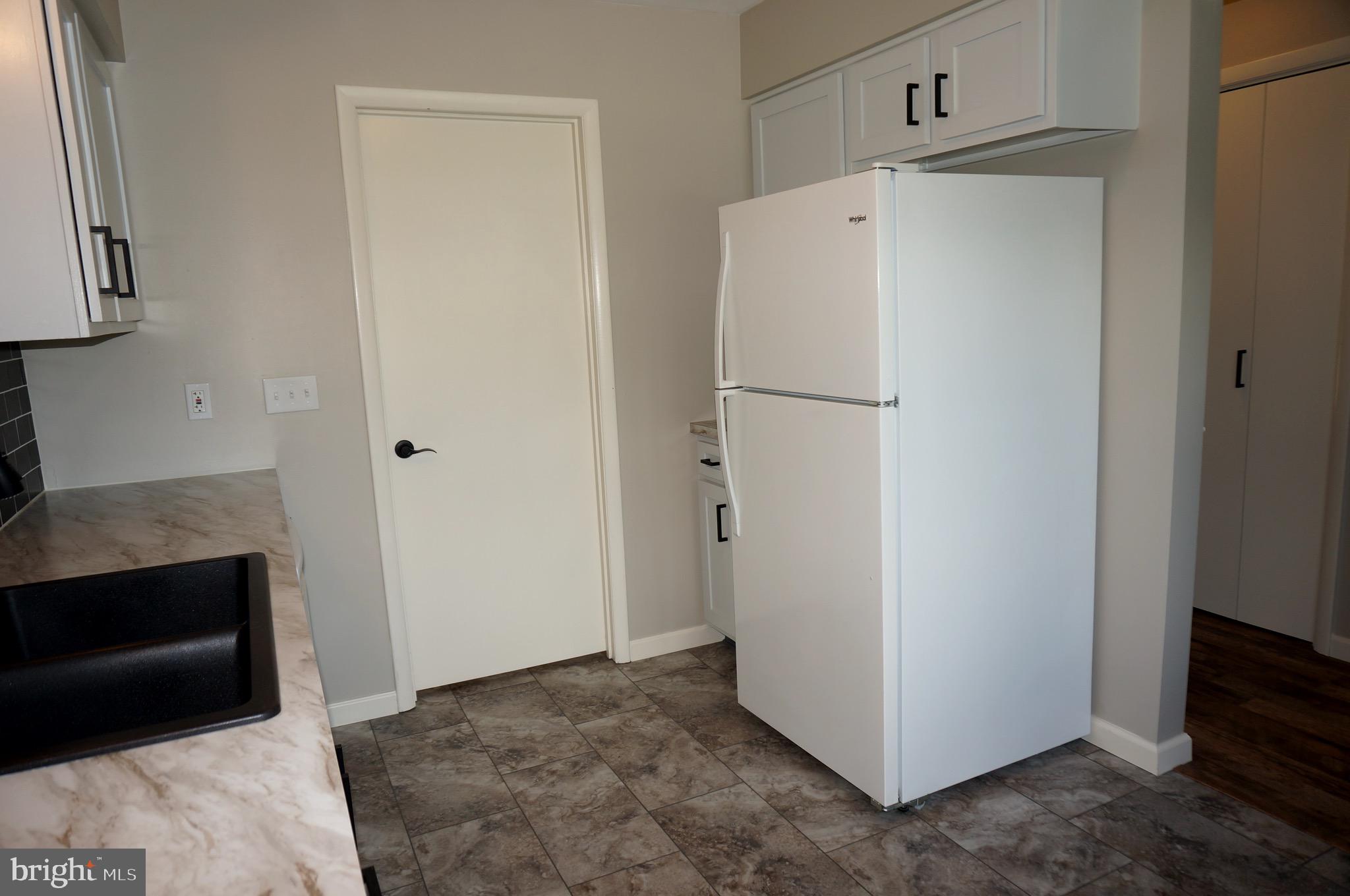 621 Range End Road, Unit 3 Dillsburg, PA 17019 - Photo 15 of 39 Marble Pattern Laminate Counters Door to Laundry