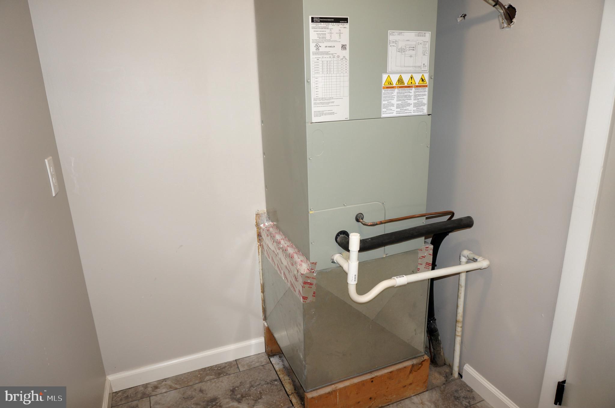 621 Range End Road, Unit 3 Dillsburg, PA 17019 - Photo 20 of 39 Laundry/Utility Room with New Heat Pump