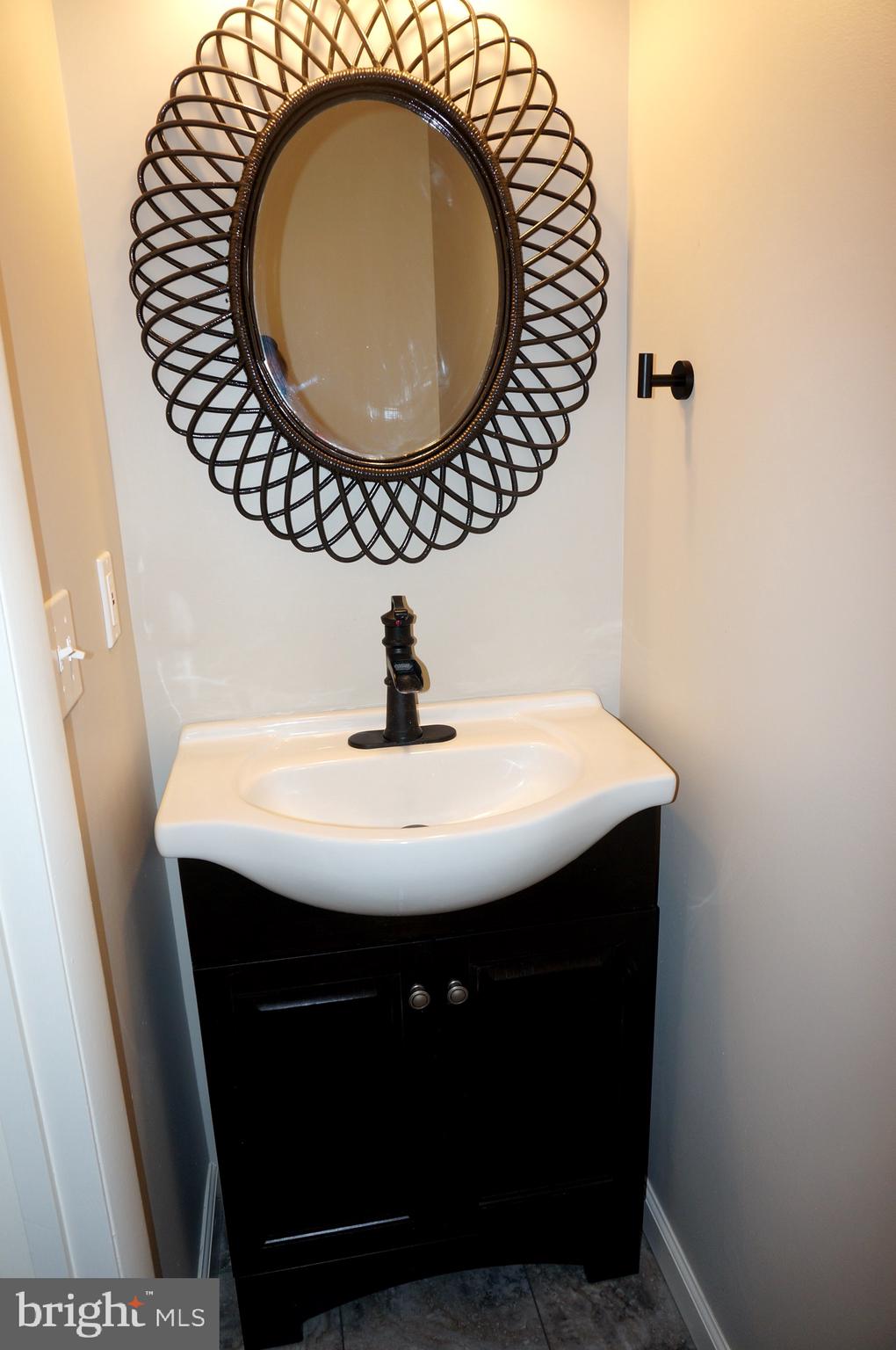621 Range End Road, Unit 3 Dillsburg, PA 17019 - Photo 21 of 39 Half Bath at Entry with Tasteful New Fixtures