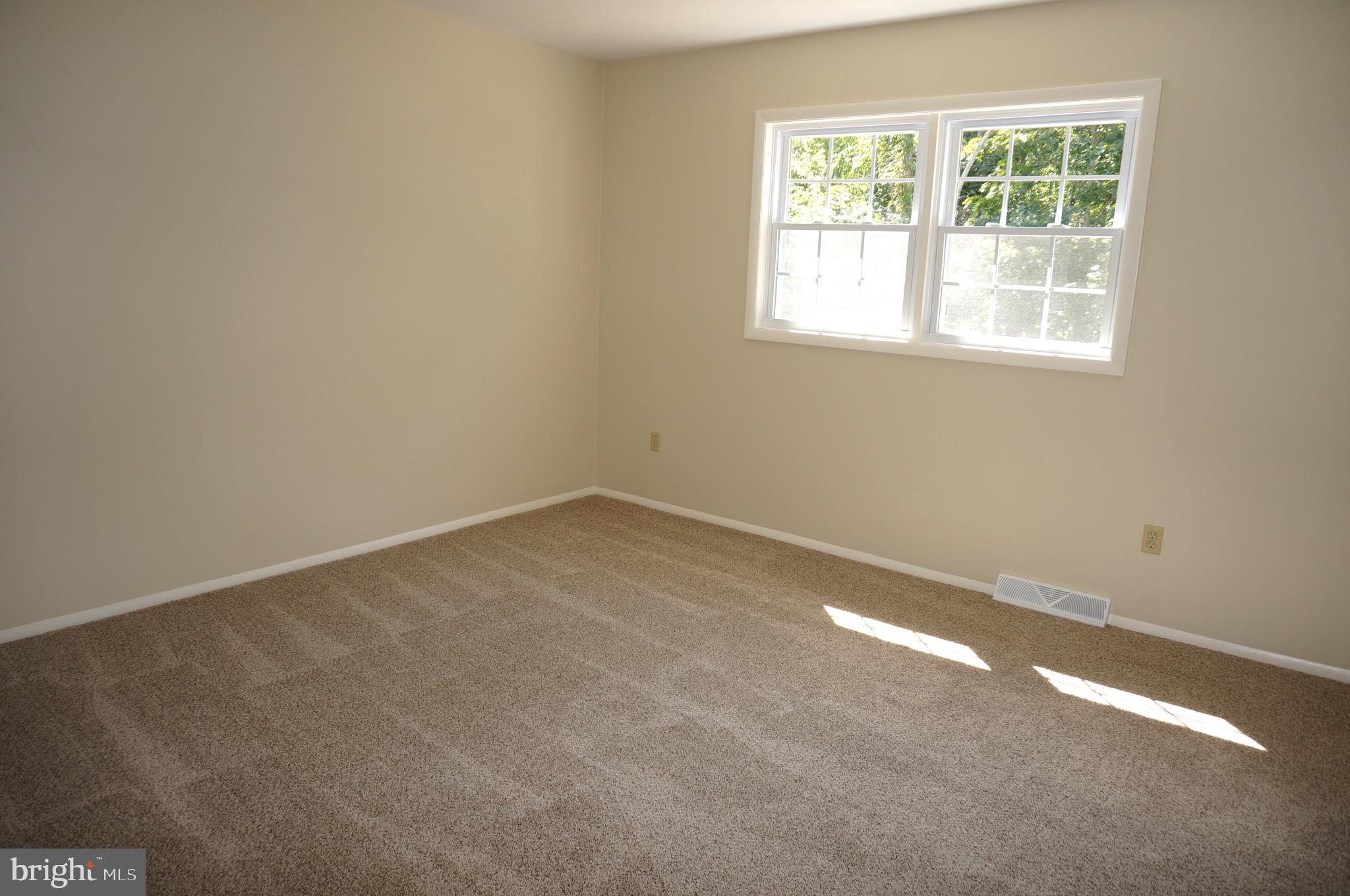 621 Range End Road, Unit 3 Dillsburg, PA 17019 - Photo 26 of 39 Main Bedroom with Rear-Facing Windows