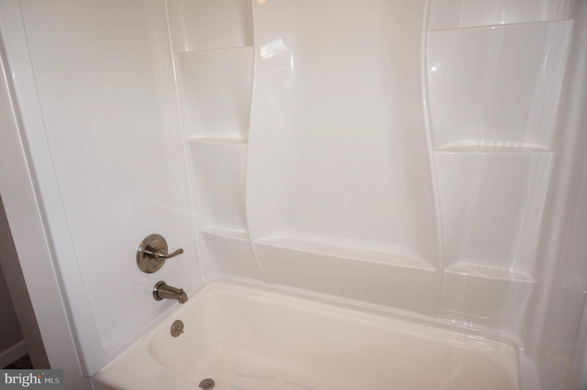 621 Range End Road, Unit 3 Dillsburg, PA 17019 - Photo 32 of 39 New Bathroom Tub/Shower with Lots of Shelving!