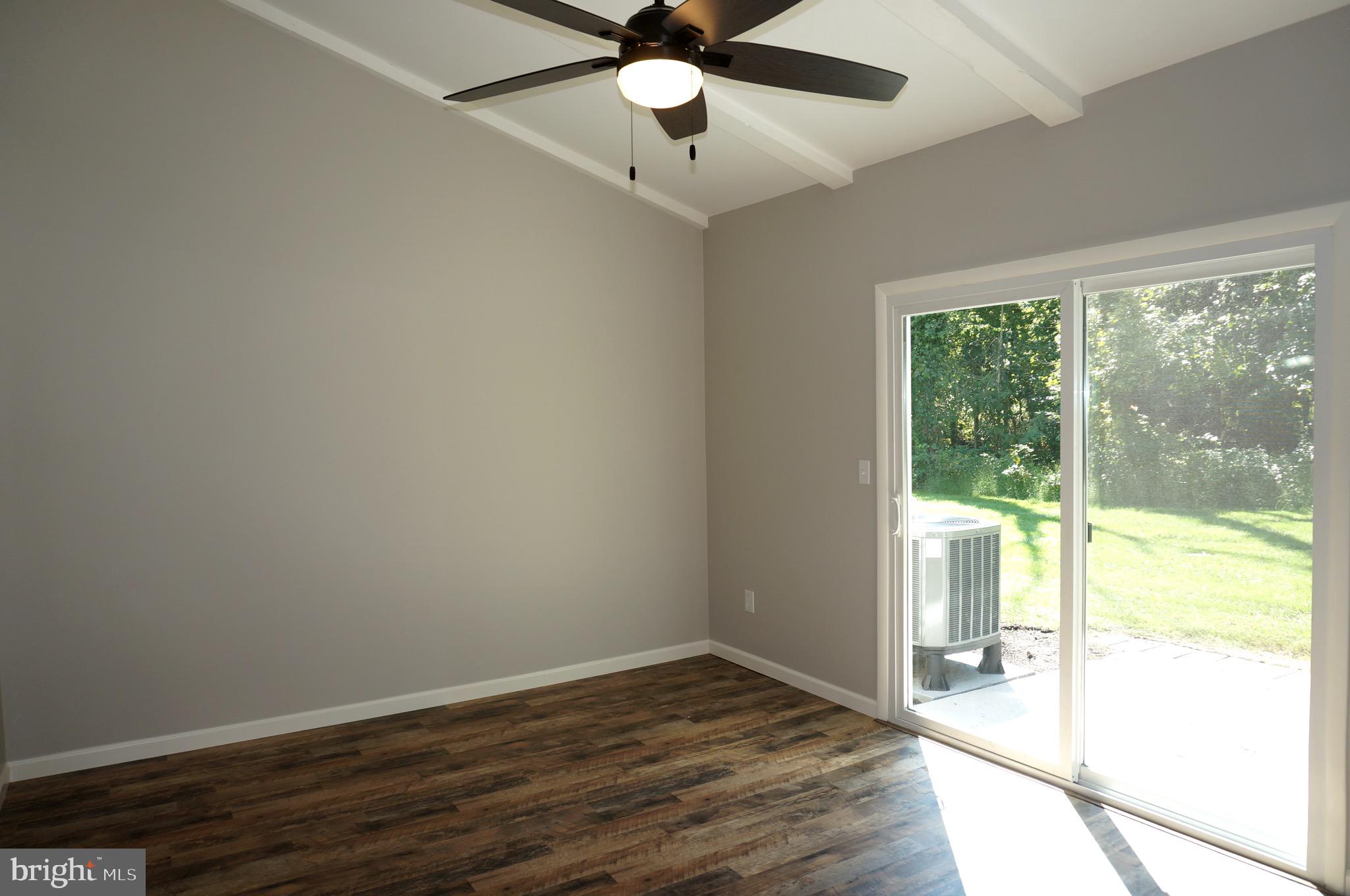 621 Range End Road, Unit 3 Dillsburg, PA 17019 - Photo 6 of 39 Living Room with Vaulted Beamed Ceiling & Fan