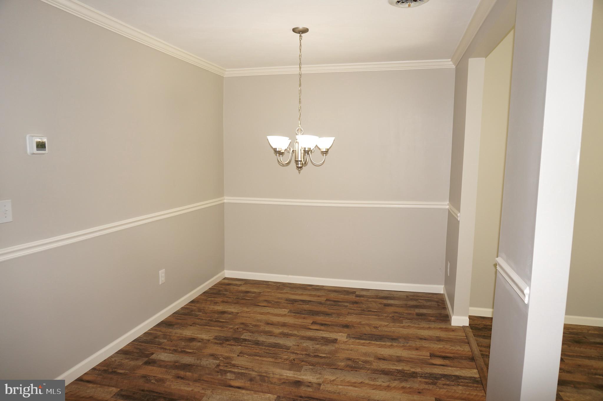 621 Range End Road, Unit 3 Dillsburg, PA 17019 - Photo 10 of 39 Dining Room with Crown & Chair Moldings