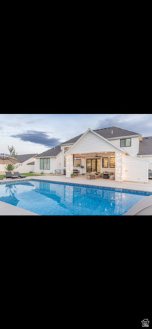 1276 West Fallow Way, Unit 76 Ogden, UT 84414 - Photo 22 of 22 Swimming pool featuring a patio area