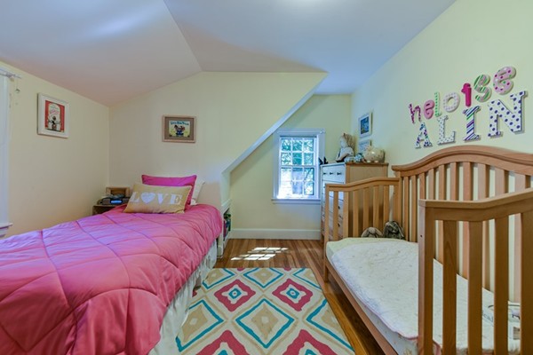 45 Earle Road Wellesley, MA 02481 - Photo 12 of 16 a bedroom with a bed and a window