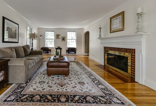 45 Earle Road Wellesley, MA 02481 - Photo 8 of 16 a living room with furniture and a fireplace