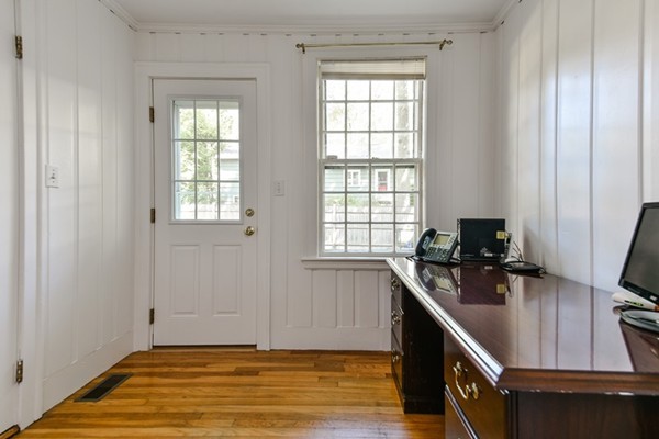 45 Earle Road Wellesley, MA 02481 - Photo 10 of 16 a view of a kitchen with a sink and windows