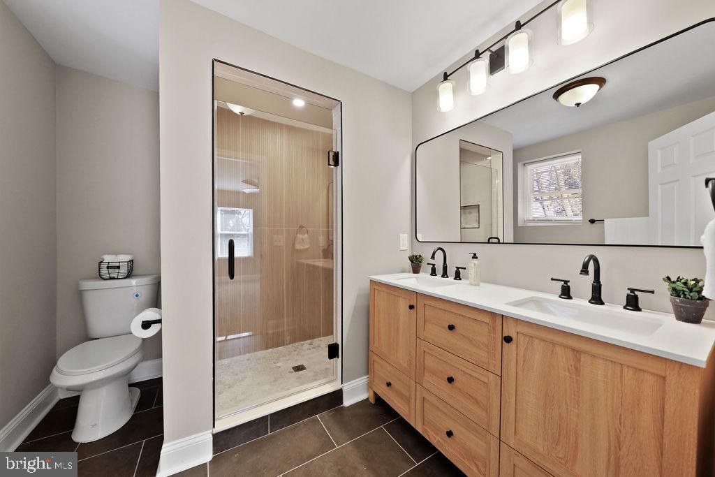 925 Union Landing Road Cinnaminson, NJ 08077 - Photo 18 of 42 Modern elegance in a serene bathroom retreat.