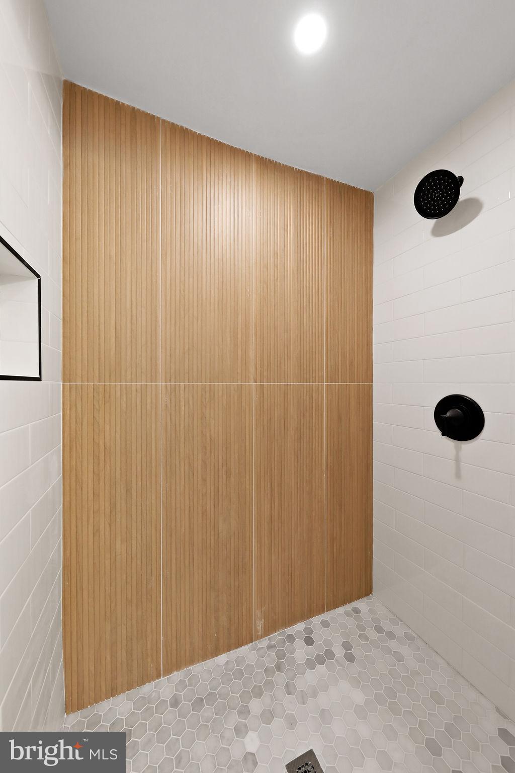 925 Union Landing Road Cinnaminson, NJ 08077 - Photo 19 of 42 Sleek shower with modern wood accents.