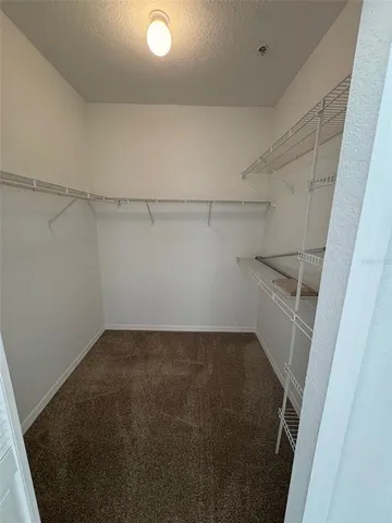 a view of a room with racks on the wall