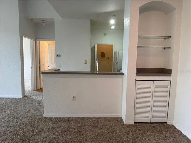 a view of a kitchen with a sink