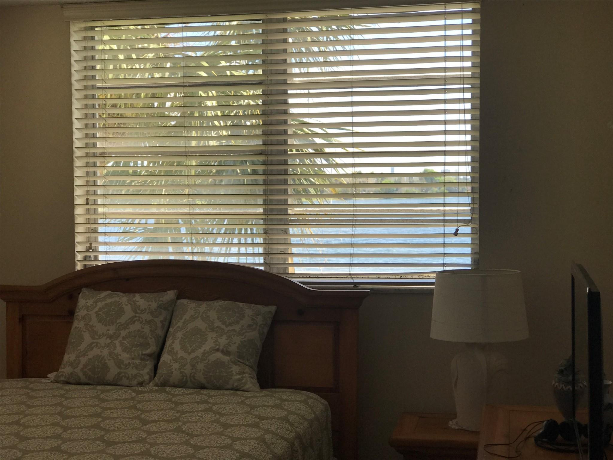 Undisclosed Address Miami, FL 33179 - Photo 3 of 9 a living room with a large window