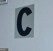 a view of a room with wooden walls