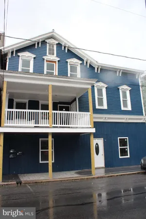 a front view of a house with windows